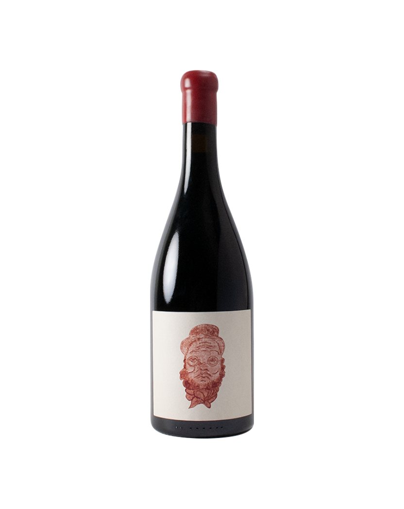 Wine bottle with a label featuring a face design on a white background